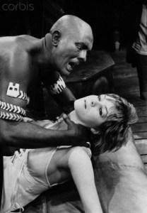 17 Dec 1970, England, UK --- Actor Jack Good as Othello, strangling his wife Desdemona, played by actress, Sharon Gurney, 1970. --- Image by © Hulton-Deutsch Collection/CORBIS