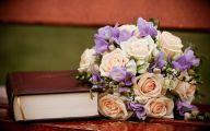 A-Bouquet-of-Flower-Next-to-a-Thick-Book-Book-is-Thus-Smelling-Good-Do-Open-and-Read-It-More-HD-Creative-Wallpaper